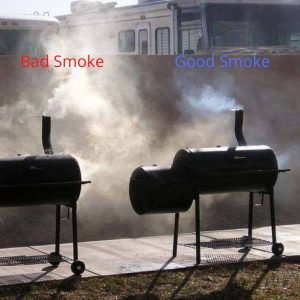 2 offset smokers with the one on the left making heavy white smoke and is labeled in red, bad smoke. The smoker on the right has a thin blue smoke coming from it and is labeled in blue, good smoke