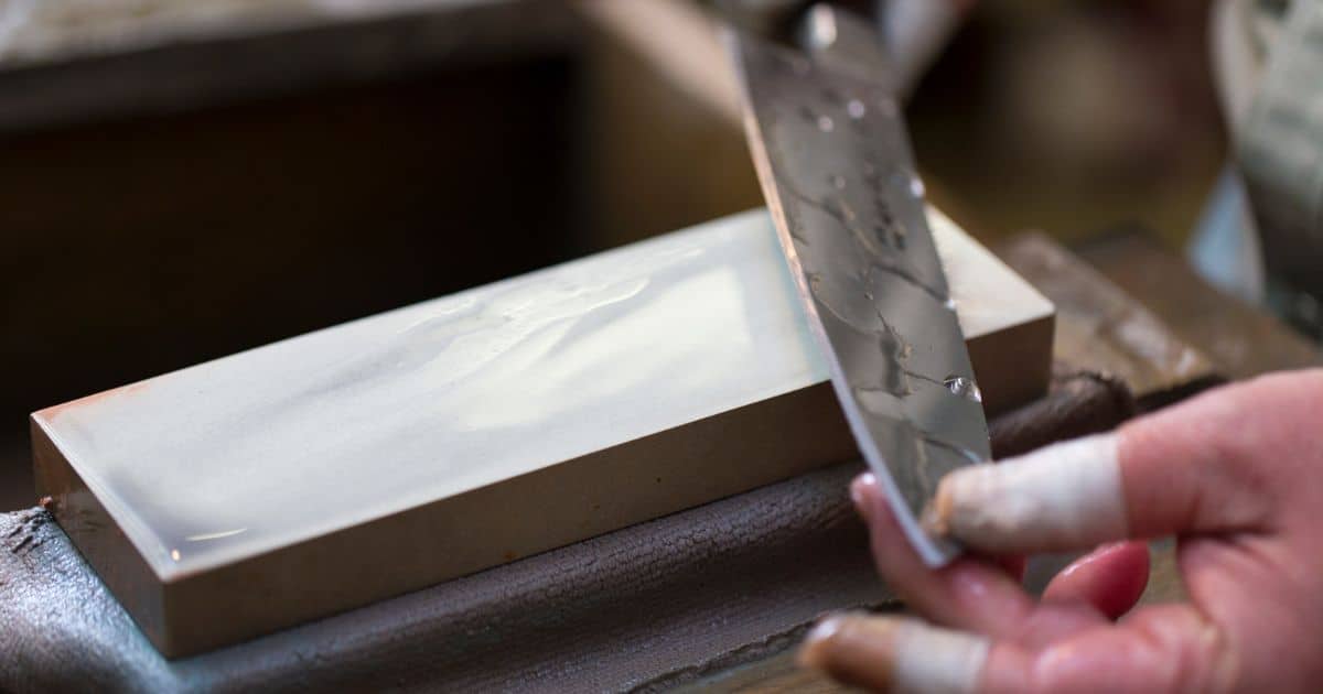 Sharpening a chef knife on a whetstone